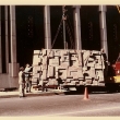 Installation of Bank of Canada Mural with Mayhew and lifting machine. Photo: Ire